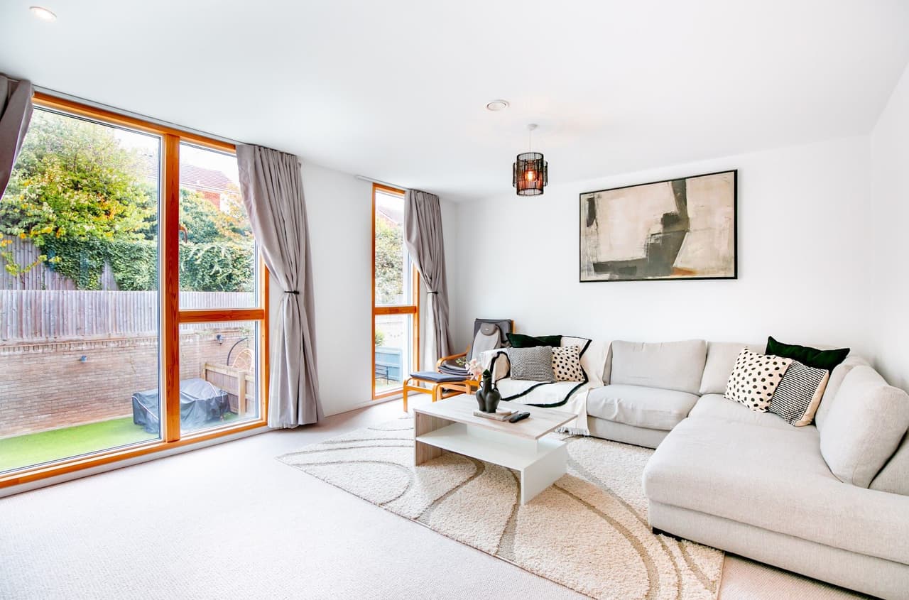 A bright living room with garden doors