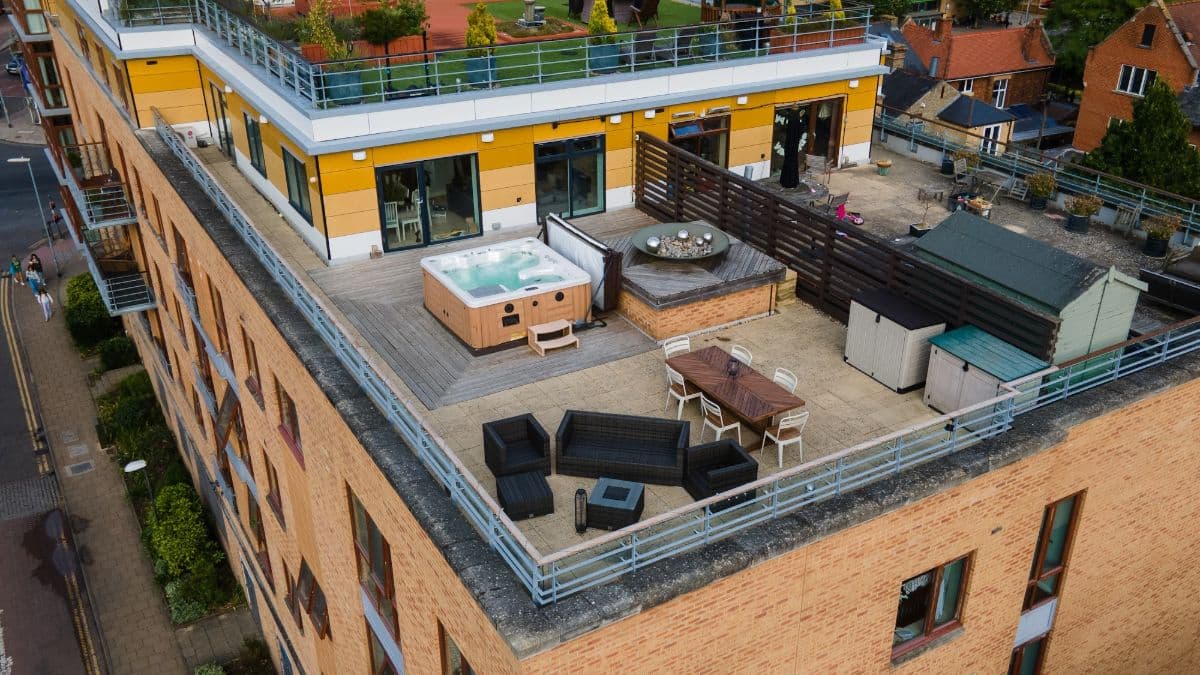 A top-floor flat with a large roof terrace
